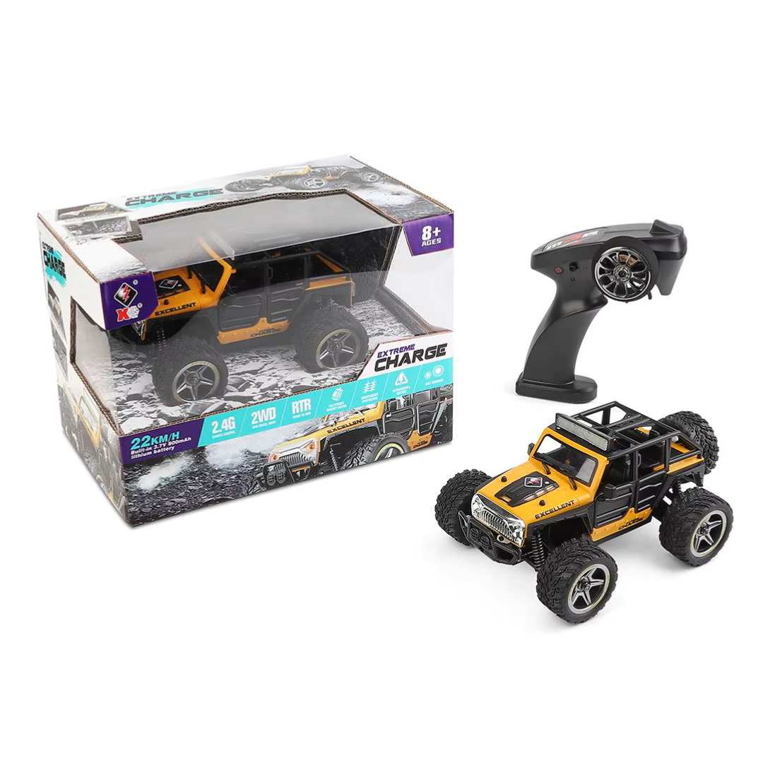 Compact off-road RC car and controller on a light background