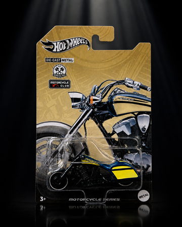 Die-cast chopper motorcycle on dark studio background