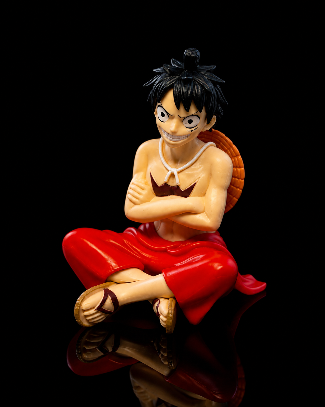Luffy sitting anime figure, angled view