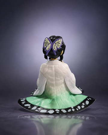 Shinobu Kocho sitting anime figure on purple studio background